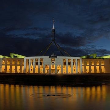 Photograph of Australian Parliament House in Canberra at dusk